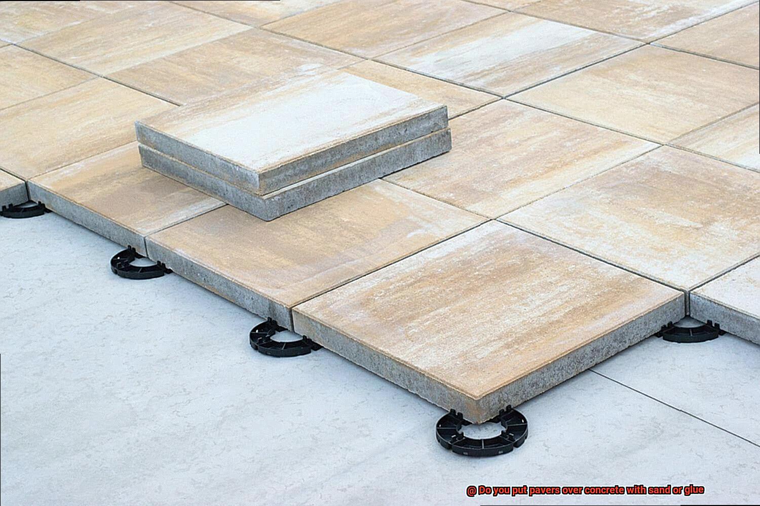 Do you put pavers over concrete with sand or glue-3