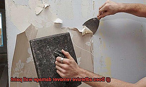 Does adhesive remover damage wall paint-9