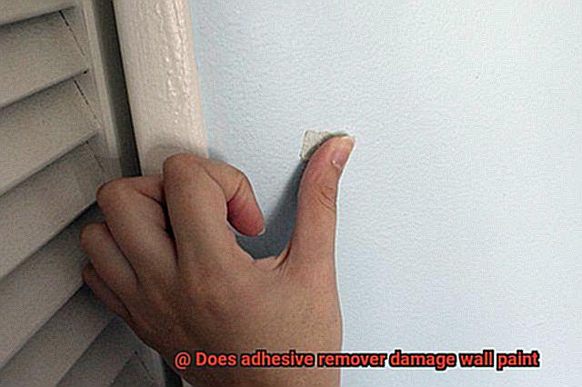 Does adhesive remover damage wall paint-5