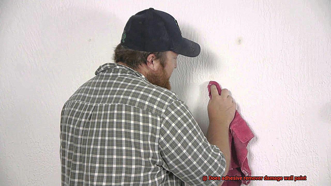 Does adhesive remover damage wall paint-8