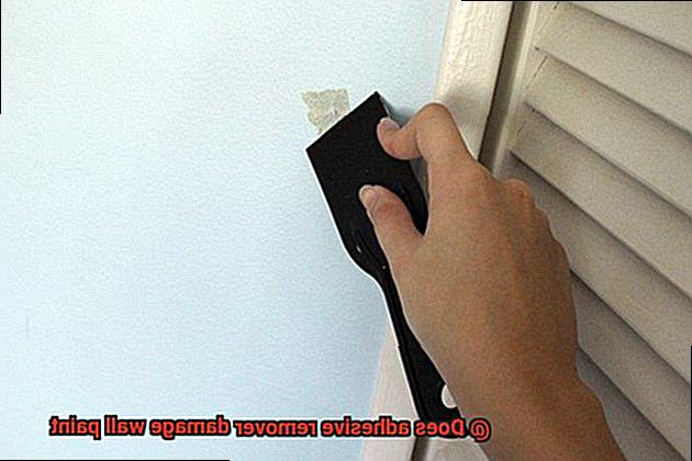 Does adhesive remover damage wall paint-6