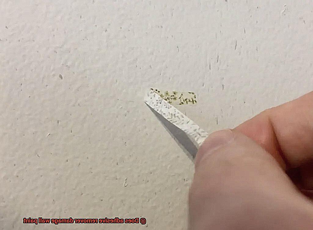 Does adhesive remover damage wall paint-7