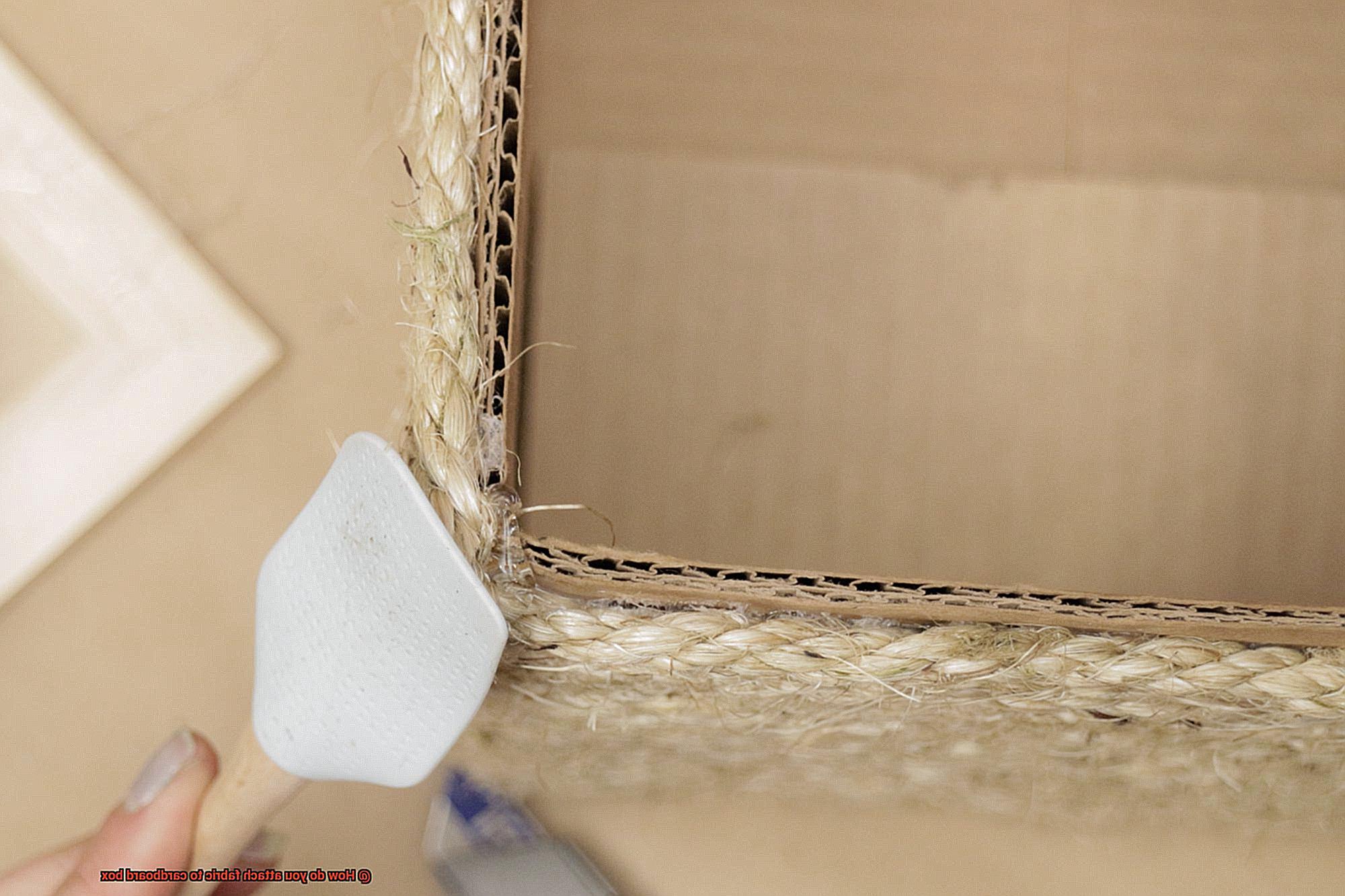 How do you attach fabric to cardboard box-4