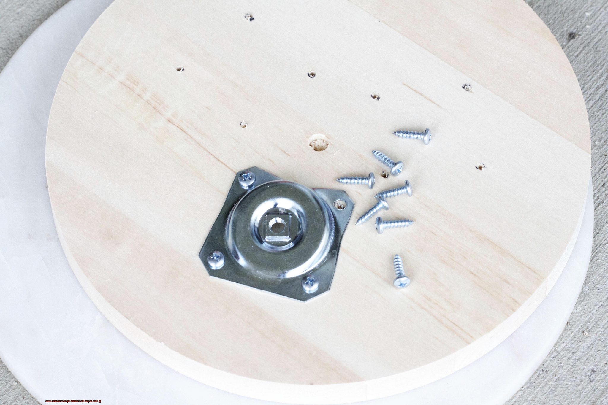 How do you fix a marble top to a wooden base? Glue Things